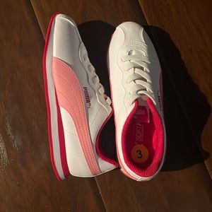 White and pink puma sneakers